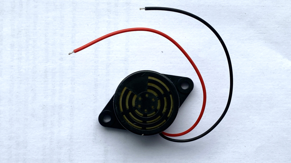 Звуковой сигнал (зуммер) заднего хода (универсальный)