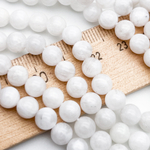 Лунный камень бусины (белая иризация), диаметр 6,5-6,6 мм, цена за 14-15 шт (1/4 нити)