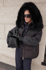 Пуховик комбинированный с мехом на капюшоне