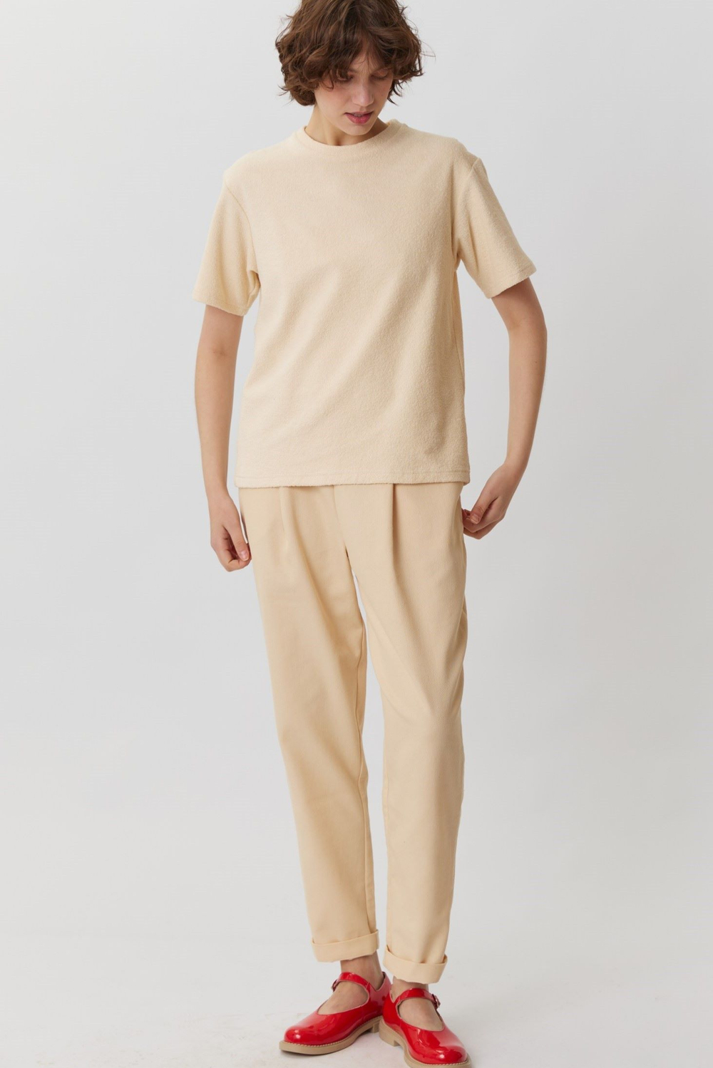 Брюки зауженные из бежевой джинсы