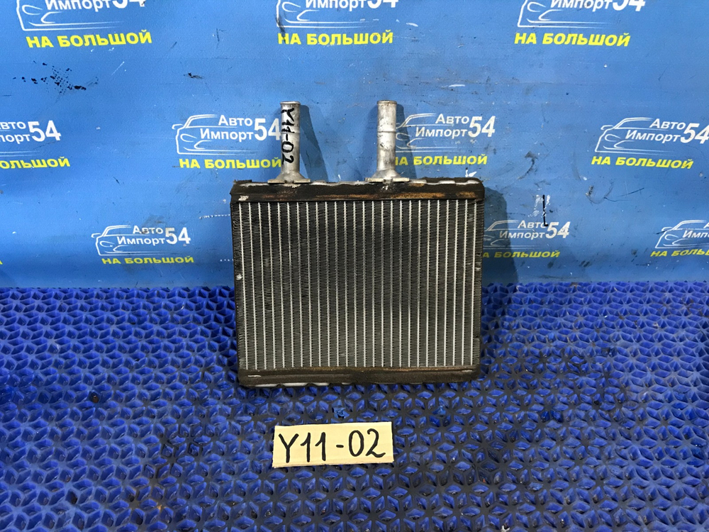 Радиатор печки NISSAN AD 1999