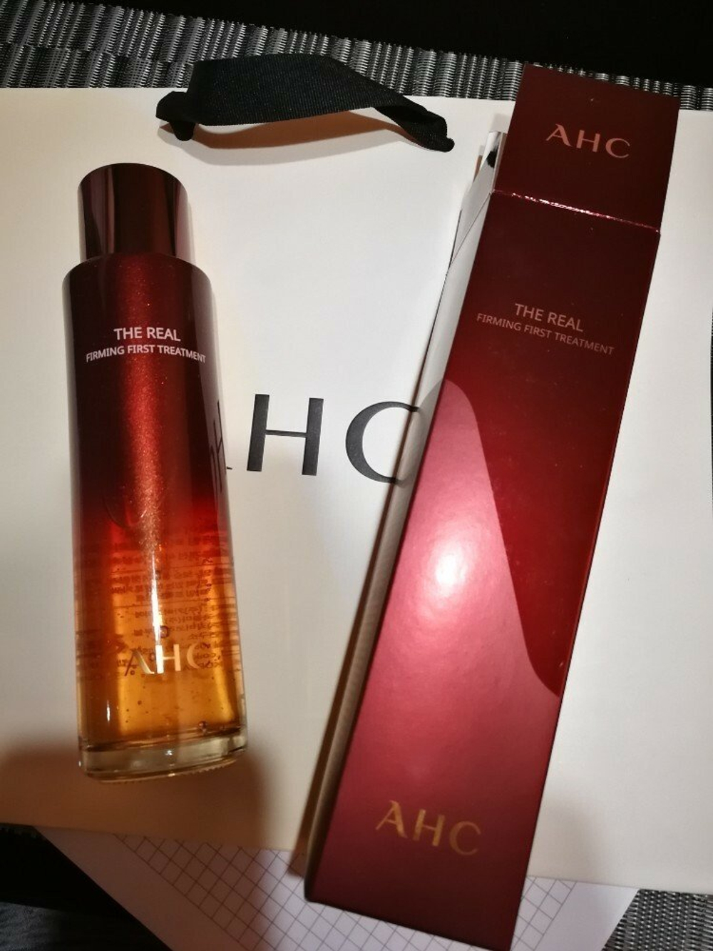 AHC the real firming first treatment -  2 в 1 тонер – эссенция