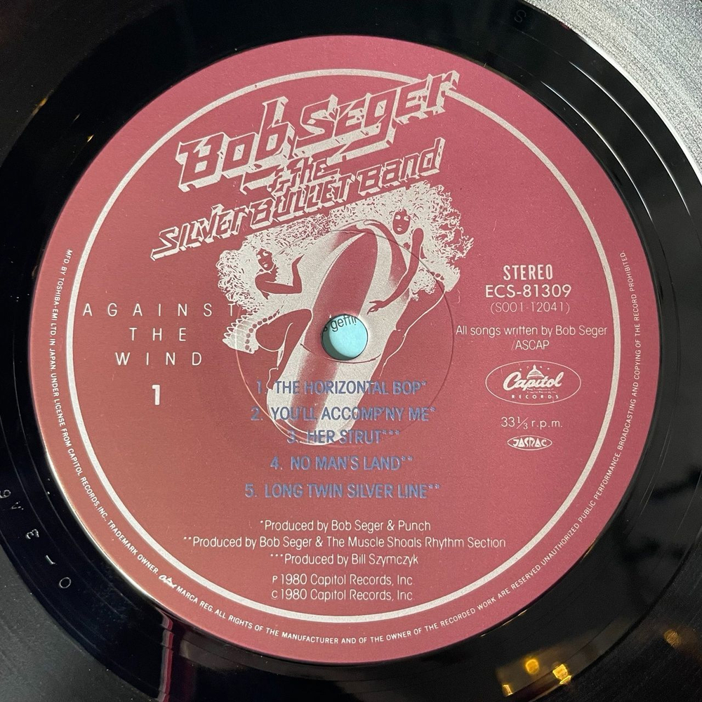 Винтажная виниловая пластинка LP Bob Seger and The Silver Bullet Band Against The Wind (Japan 1980) (Obi)
