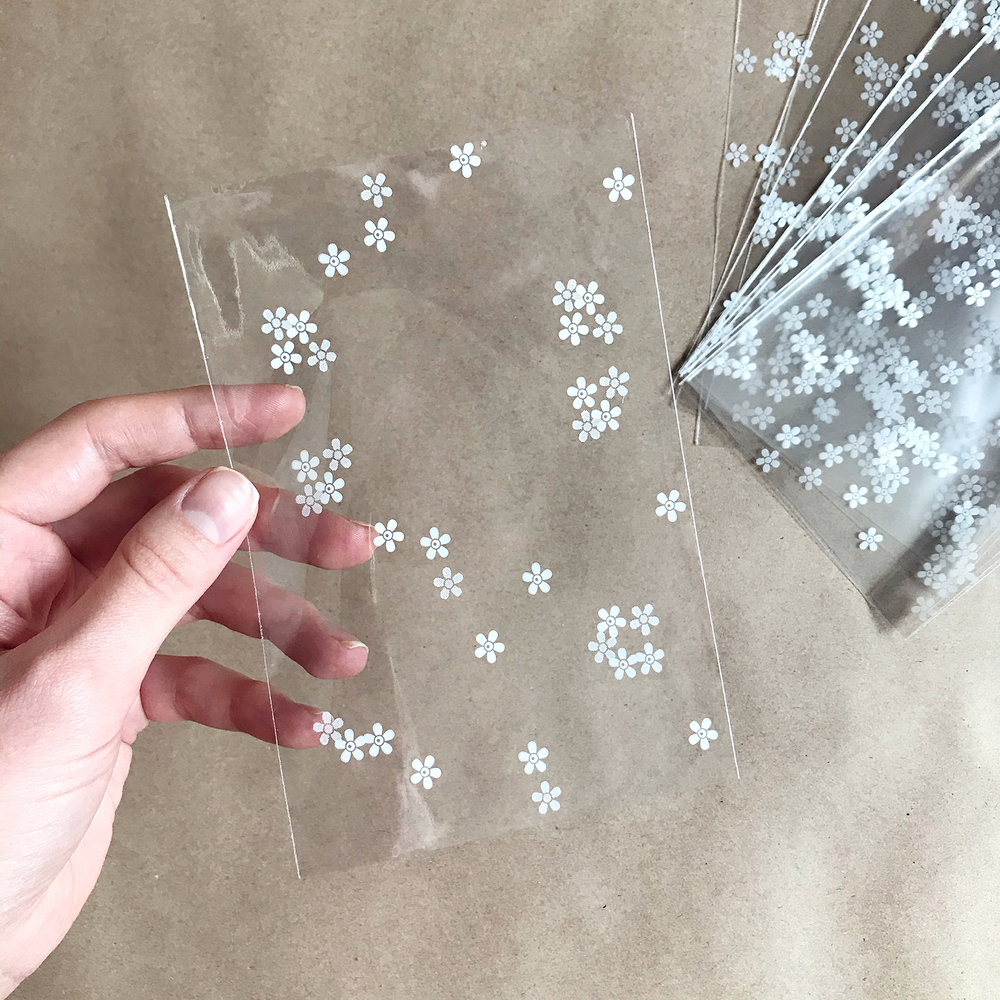 Прозрачный пакет 10х15 см (белые цветы), 100 шт