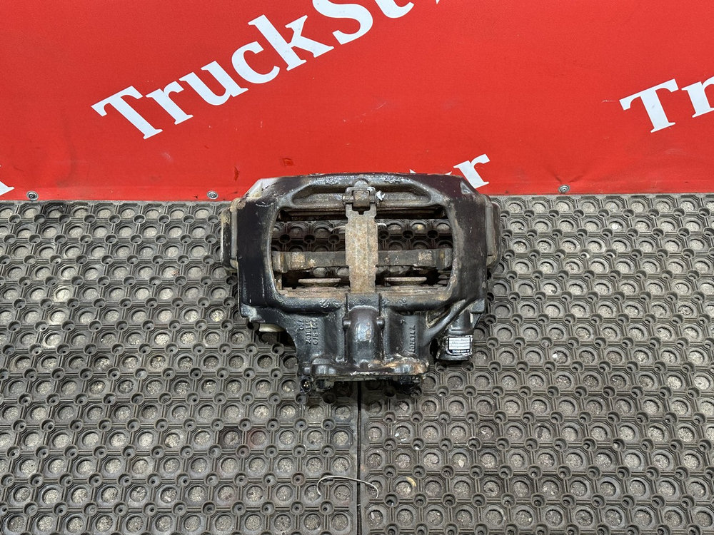 Суппорт передний левый