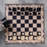 Шахматы обиходные "Настоящий мужчина", пластиковые с кожаной доской 33*33см