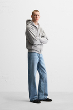 Джинсы flared fit