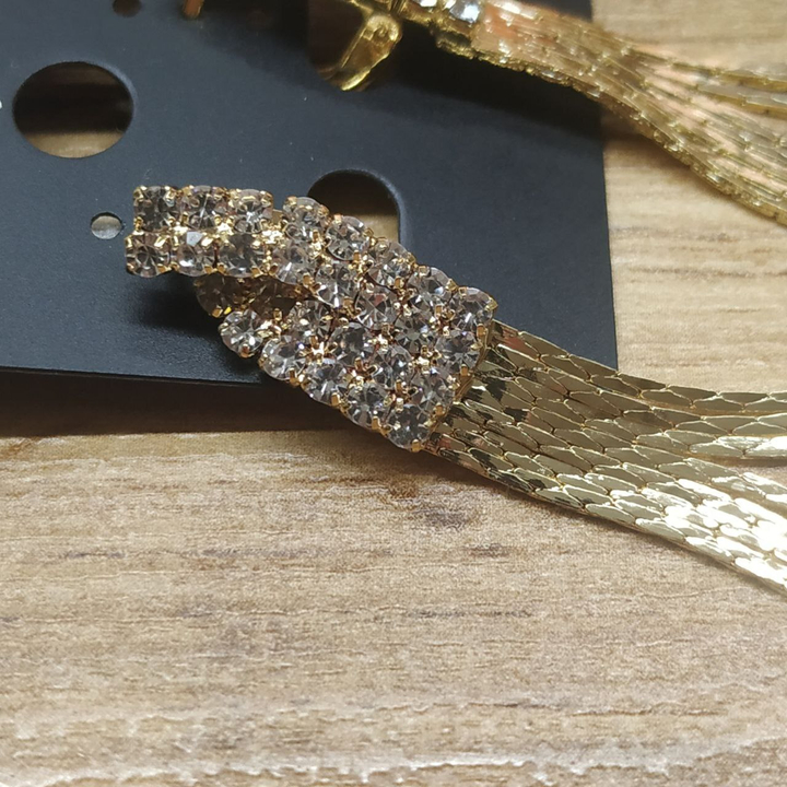 Серьги англ.заст. Bogema изгиб страз цепочки жгутики металл золотистый