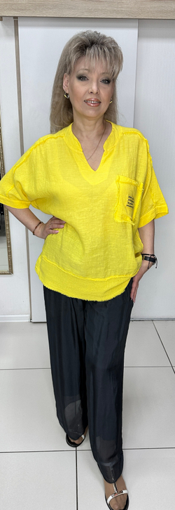 Льняная туника с кармашком и бахромой