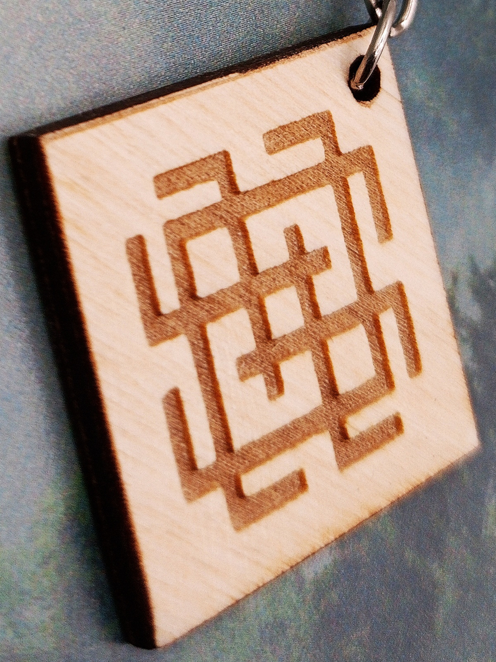 Брелок из дерева Белобог