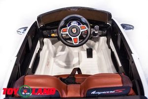 Детский электромобиль Toyland Porsche Macan белый фото №9
