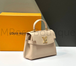 Бежевая сумка Lockme Ever Mini Louis Vuitton