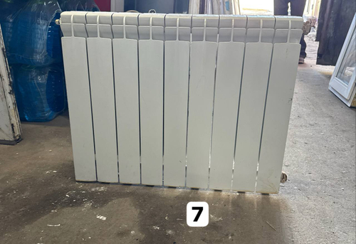 Биметаллический радиатор Б/У 500 9 секц. бок.