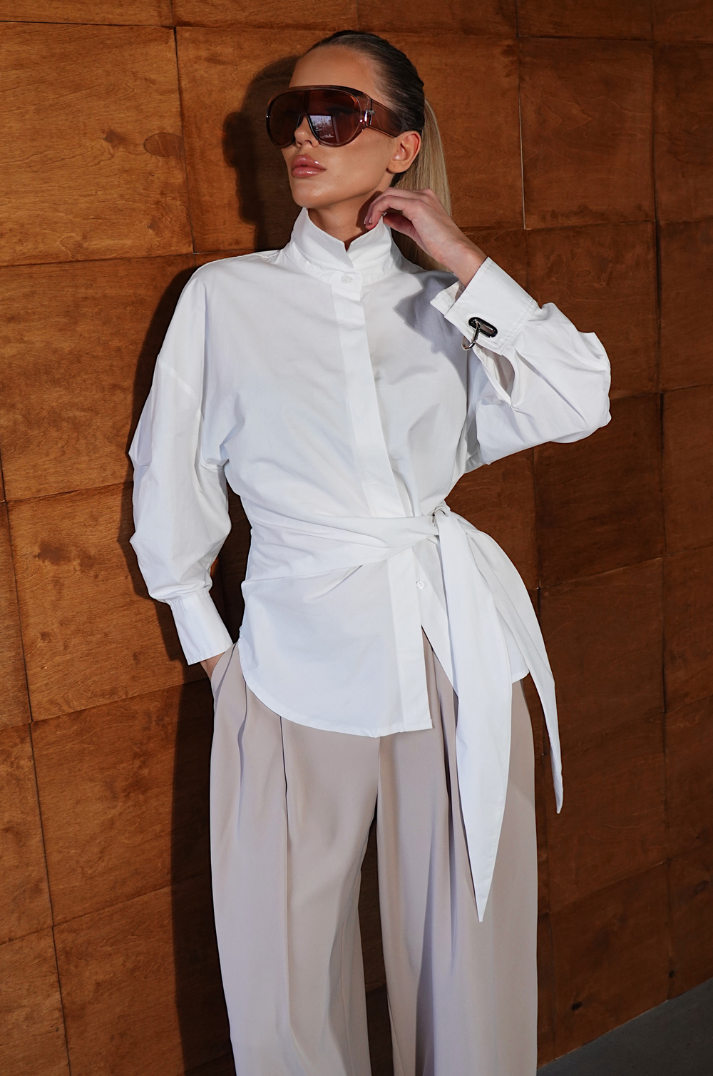 Брюки широкого кроя с защипами