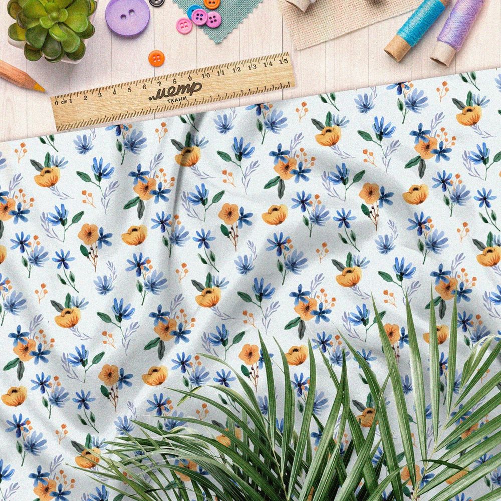 Ткань кулирная гладь оранжевые цветочки с голубыми листочками