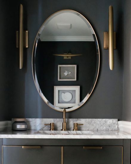 Золотое овальное зеркало “Хоган”