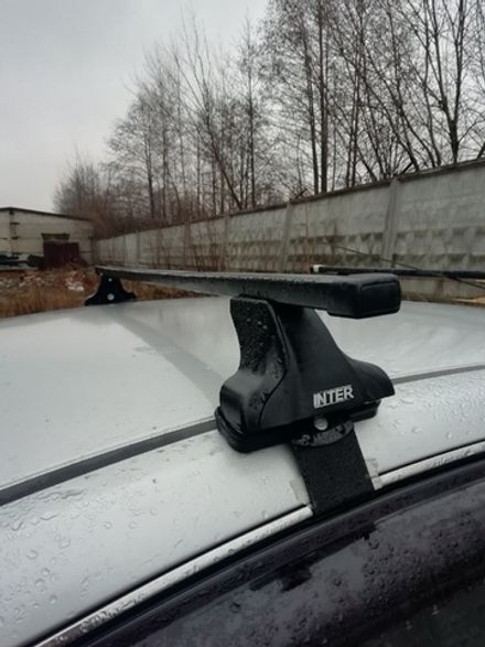 Багажник Интер Спектр на Nissan Almera 2012+  прямоугольные дуги 120 см.