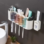 Подставка для умывальных принадлежностей «Универсальная» 4 стакана + дозатор для зубной пасты 6291-2