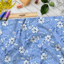 Ткань бифлекс редкие элементы гжели на голубом фоне