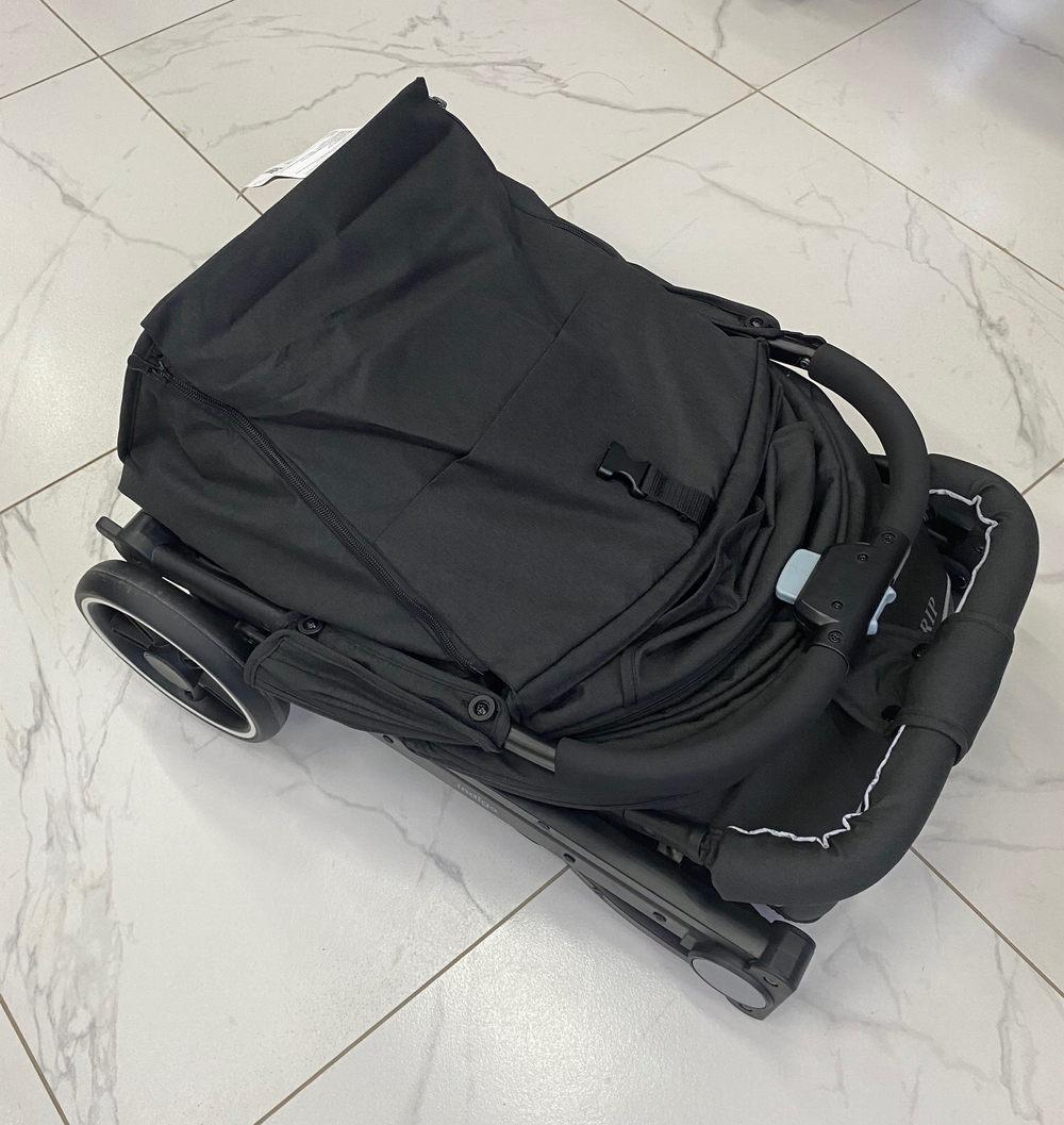 Коляска прогул. TRIP (2кол.(14см)2кол.(19см), съемн.бамп.) (Indigo) (черный)