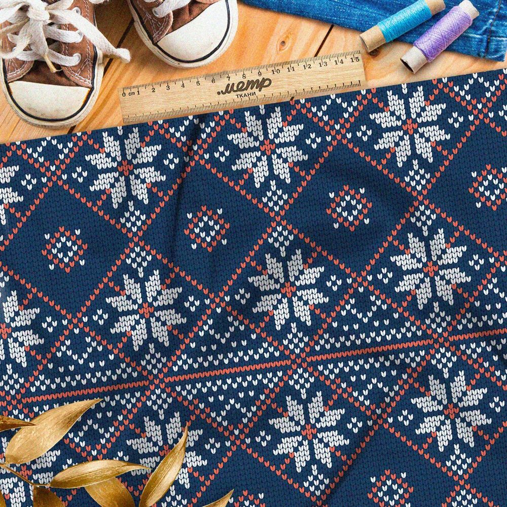 Ткань шифон красно-белая вышивка на синем свитере