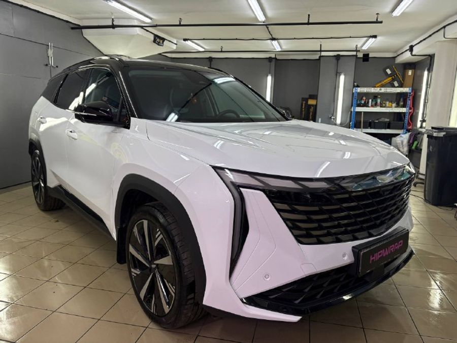 GEELY ATLAS полиуретановой пленкой CARBINS с жёстким топом, специально разработанным для белых автомобилей