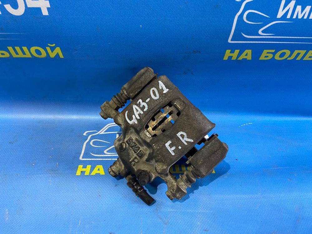 Суппорт тормозной передний правый Honda LOGO 1997