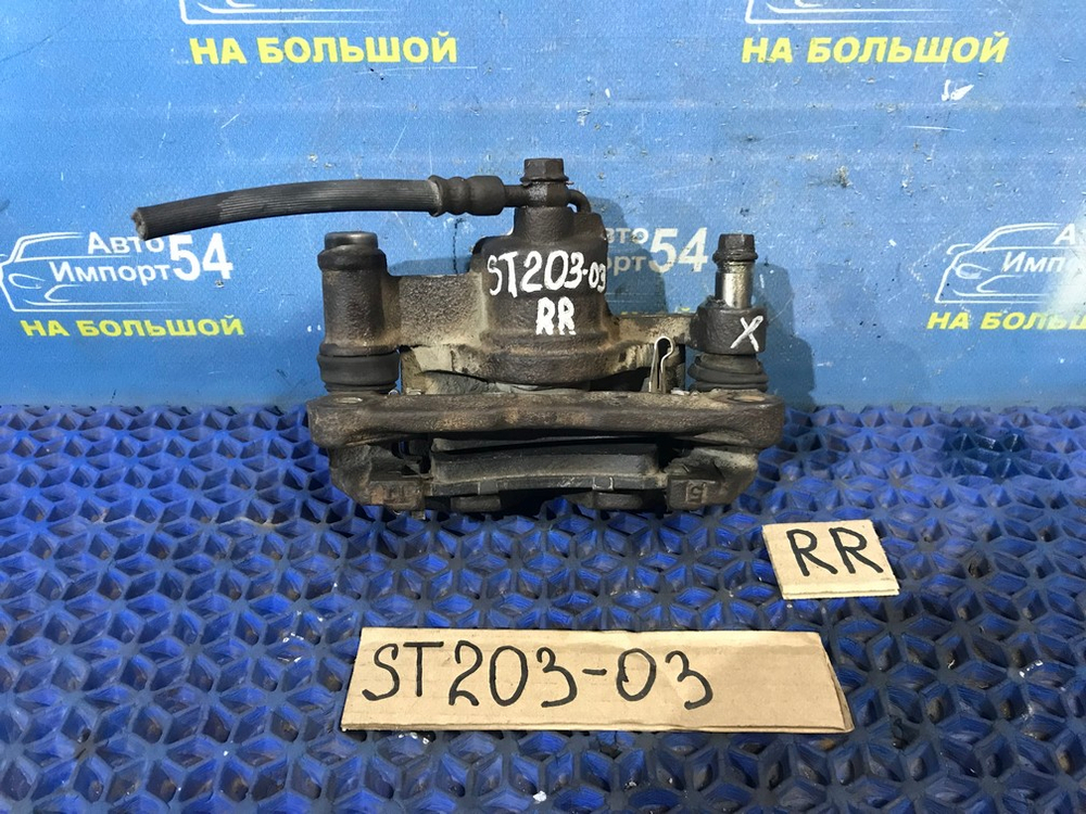 Суппорт тормозной задний правый TOYOTA CORONA EXIV 1996