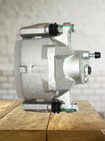 Суппорт передний правый 1014001810 для Geely MK, MK Cross