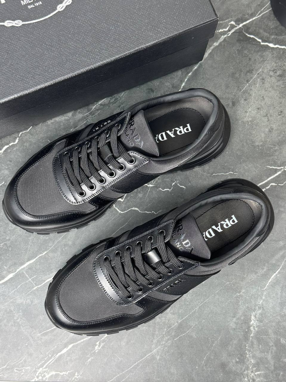 Кроссовки Prada