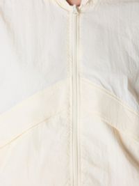 Олимпийка из нейлона "Молоко" женская