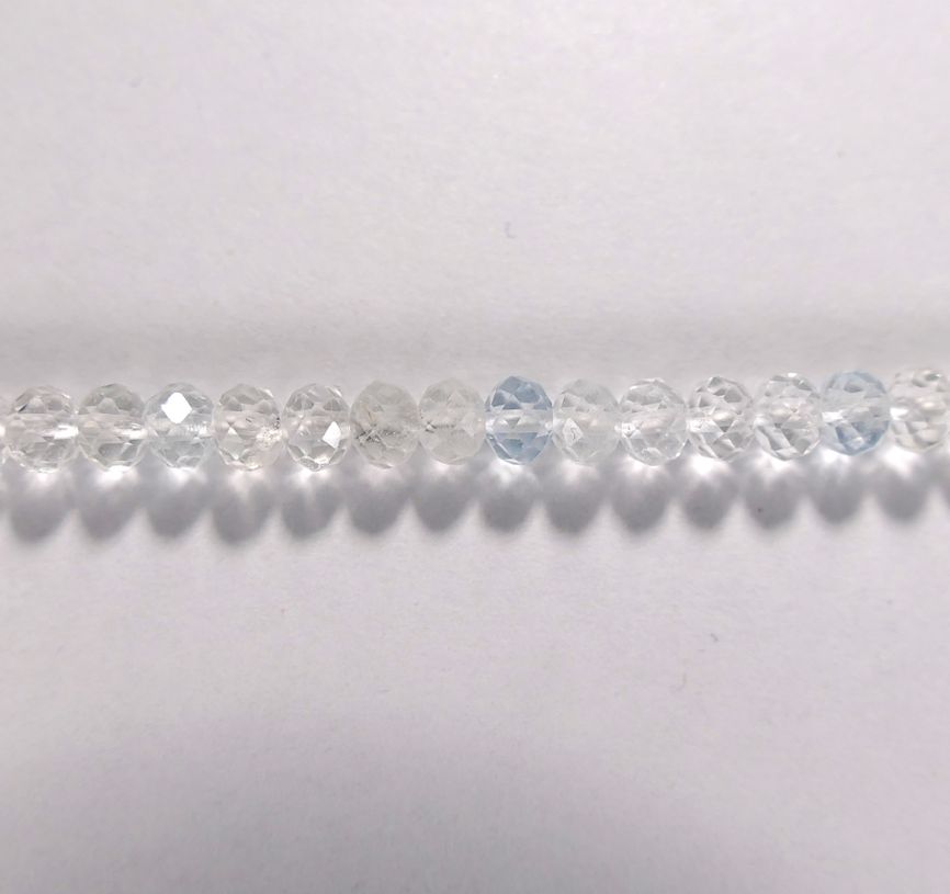 Бусина из топаза бесцветного, фигурная, 4x6 мм (рондель, граненая)