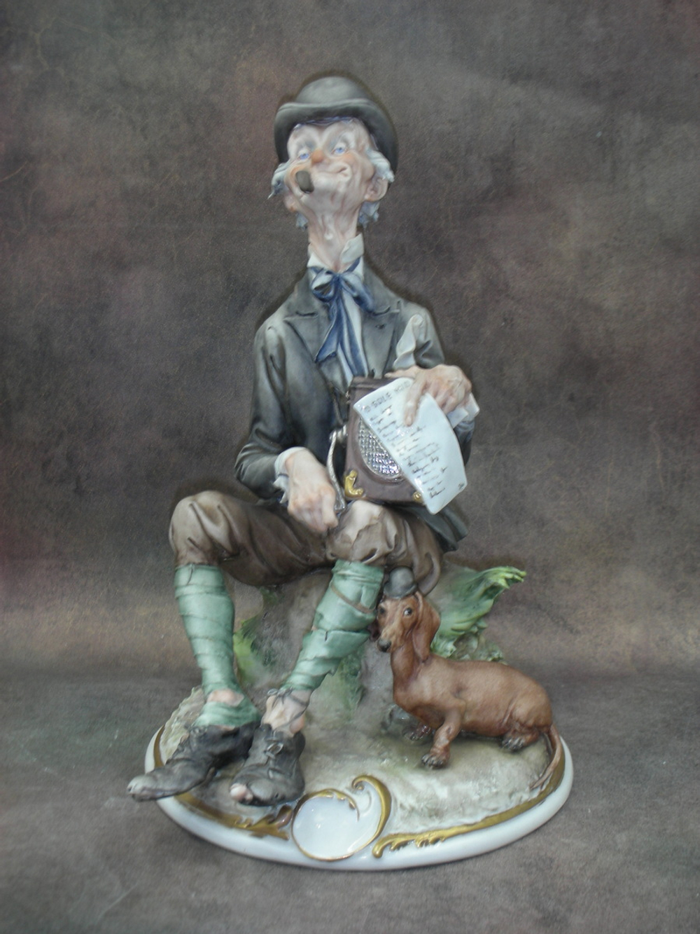 Статуэтка. Фарфор. Шарманщик. Capodimonte. Италия