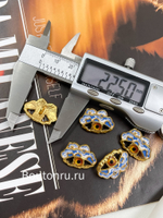 Пуговицы Скиапар. золотистые в форме глаза с белой и синей эмалью