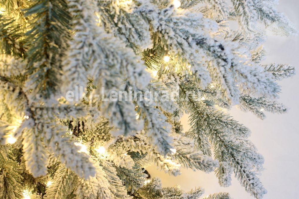 Заснеженная ель с гирляндой «Россо» теплый свет (Литая+пвх) 180 см / 1,8 м