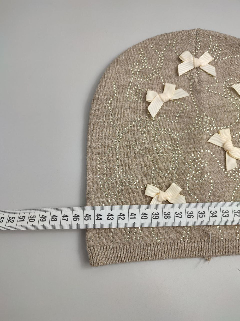 Шапка с бантиками