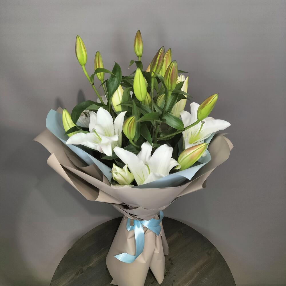 Букет из лилий в упаковке