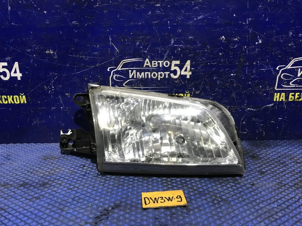 Фара передняя правая MAZDA DEMIO 2000