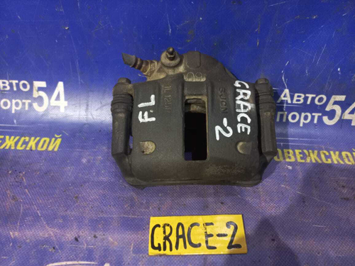 Суппорт тормозной передний левый HYUNDAI Grace 1995