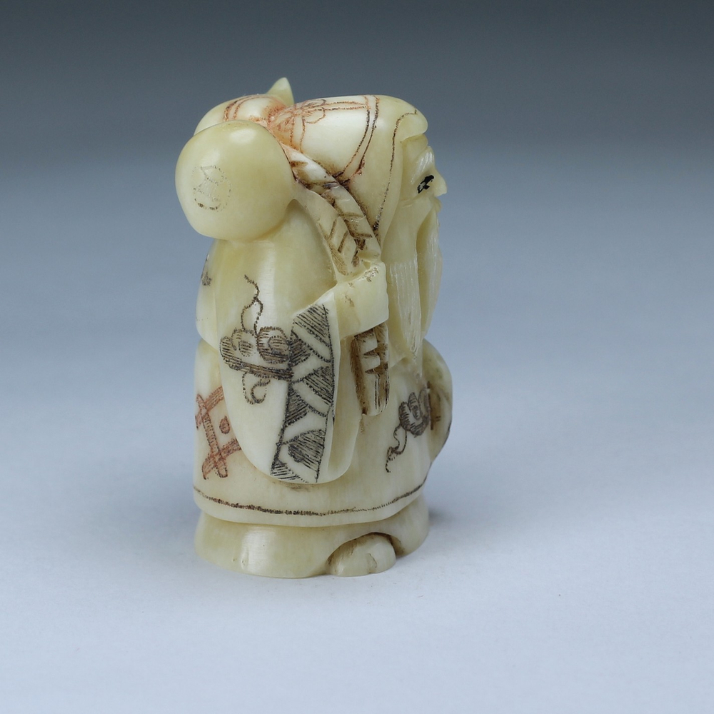 Нэцкэ Фукурокудзю с тыквой горлянкой и веером