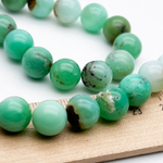 Хризопраз бусины, диаметр 10,2-10,3 мм, цена за 9 шт (1/4 нити)