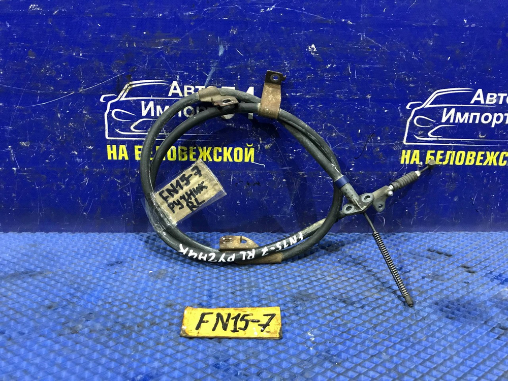 Трос ручника левый NISSAN PULSAR 2000