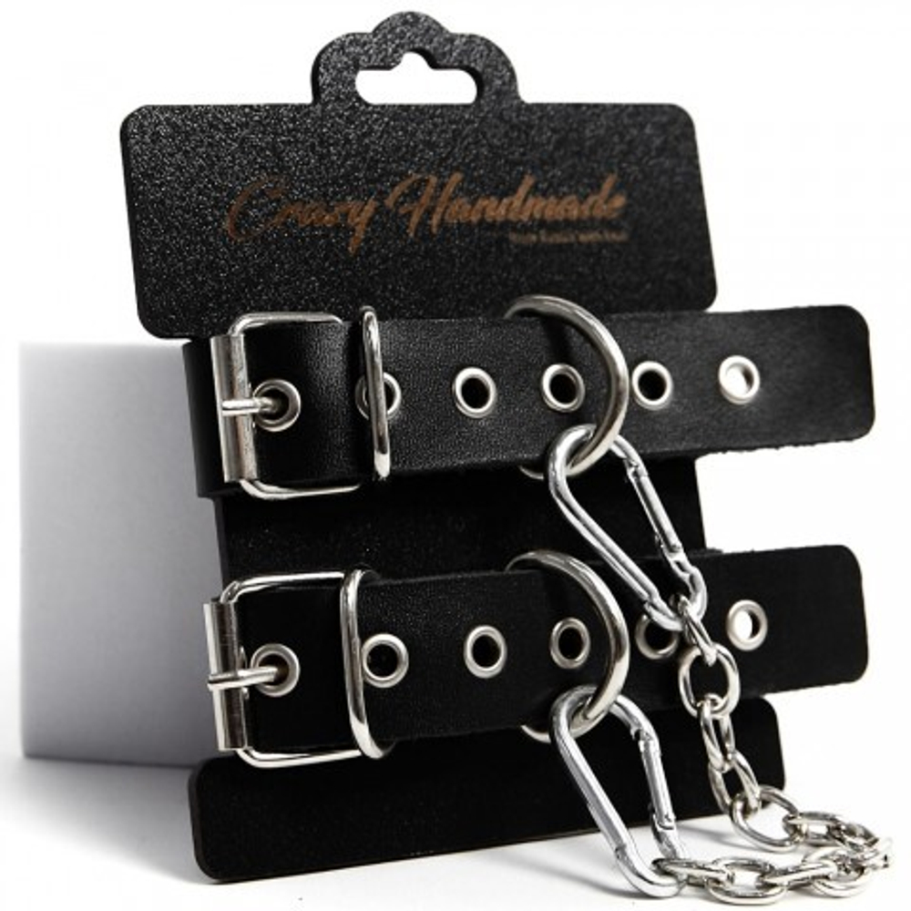 Наручники однослойные, прямоугольной формы, чёрного цвета