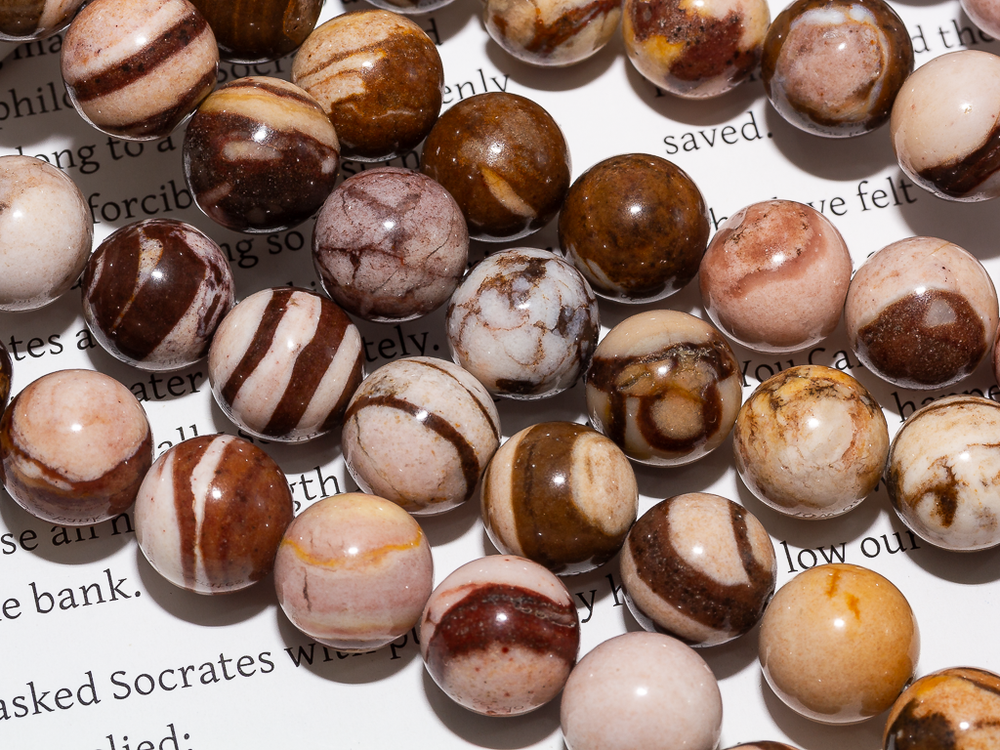 Нить бусин из яшмы 10,5мм