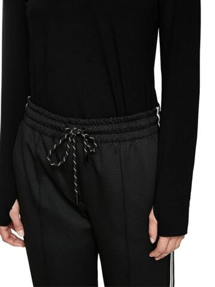 Marc Cain Брюки из ткани с эффектом перфорации