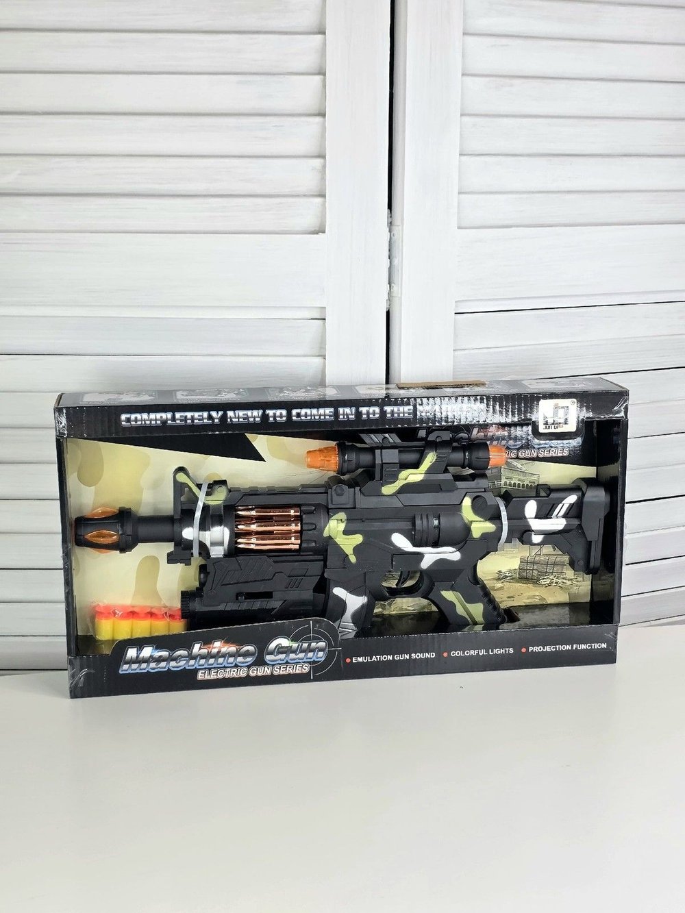 Автомат с лазерным прицелом свет/звук/мягкие пули в коробке (200346852)