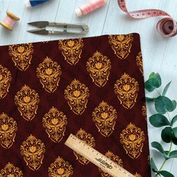 Ткань оксфорд 600 симметричный золотой узор на бордовом фоне