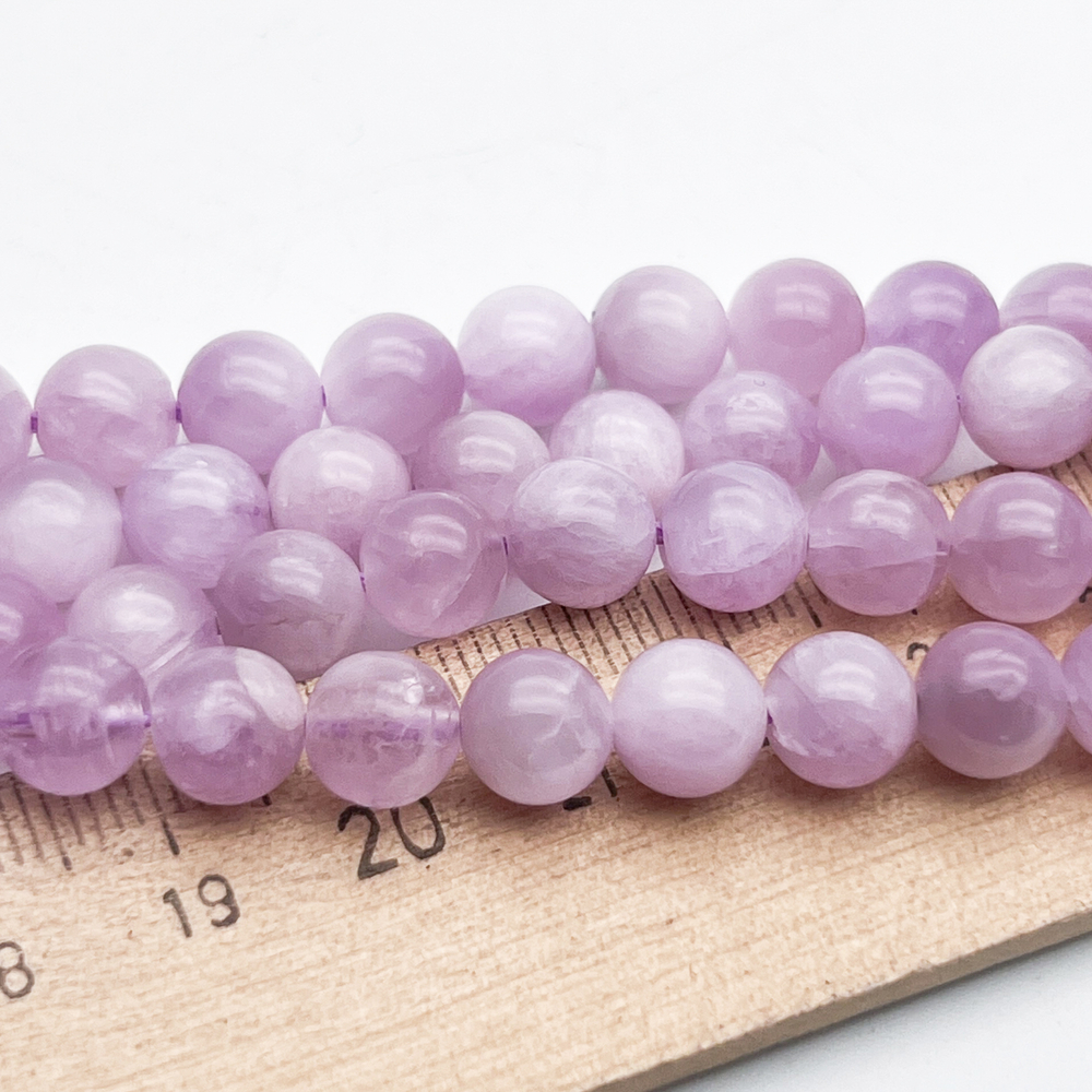 Кунцит бусины, диаметр около 7,5-7,8 мм, цена за 13 шт (1/4 нити)