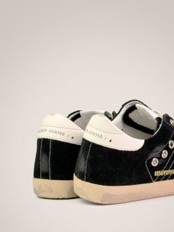 Super Star in black suede with with white leather star and heel tab