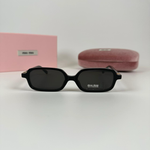 Солнцезащитные очки Miu Miu